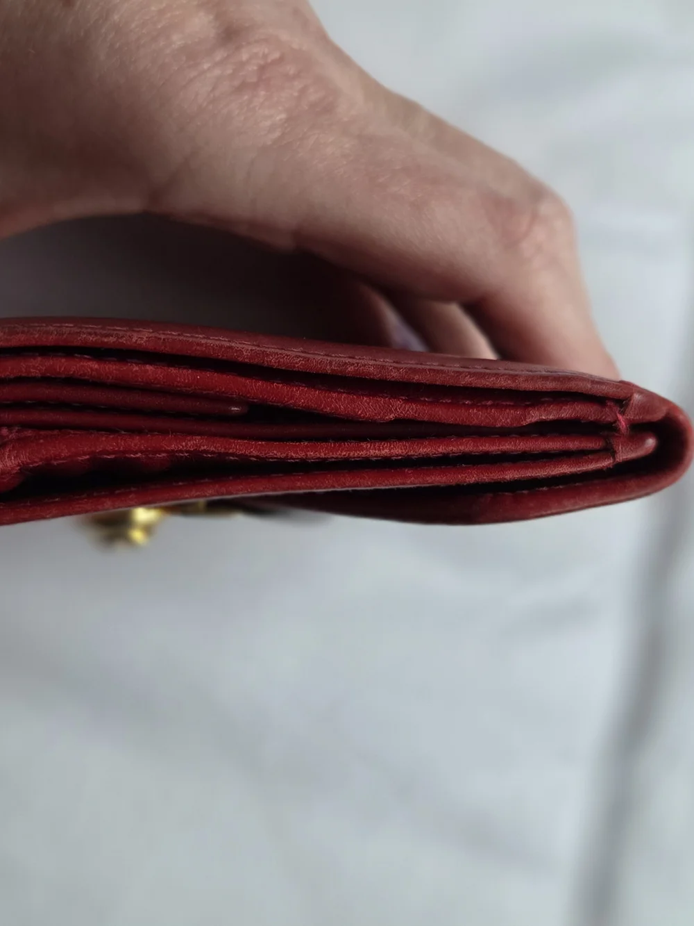 Red Leather Salvatore Ferragamo Wallet Featuring a Gold Gancini Clasp
